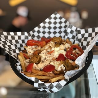 Chicken Cheesesteak Basket Fries With Cherry Peppers